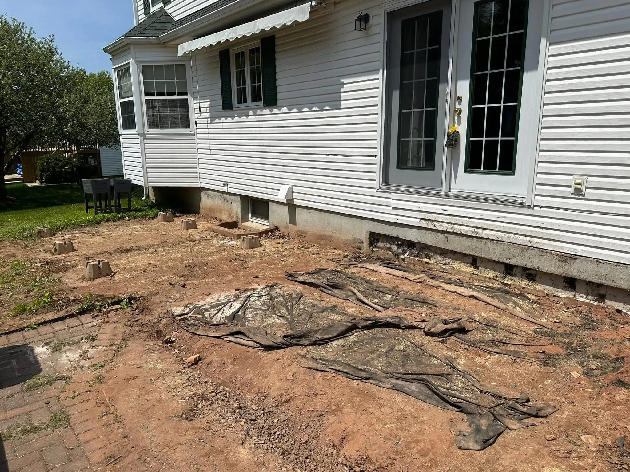 Area beside a house excavated and cleared ahead of a new patio